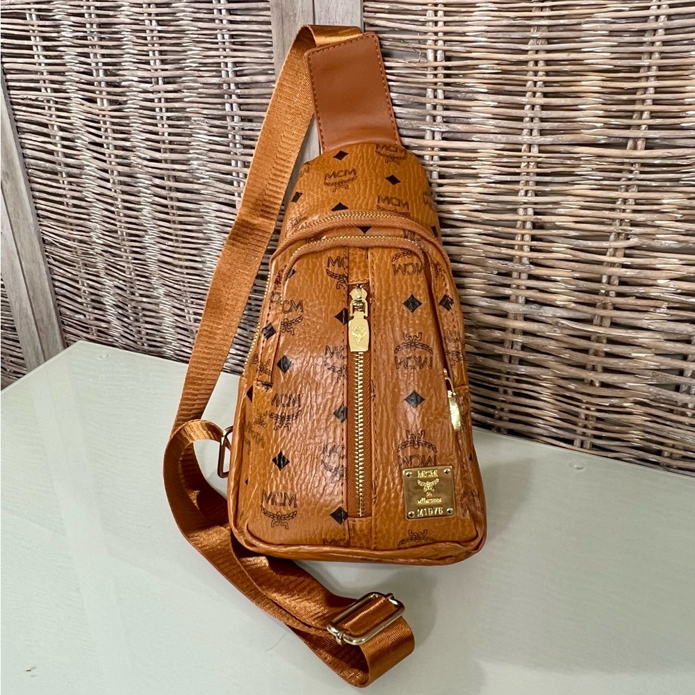 Timeless luxury and intuitive design. Classic Golden Brown Sling bag.